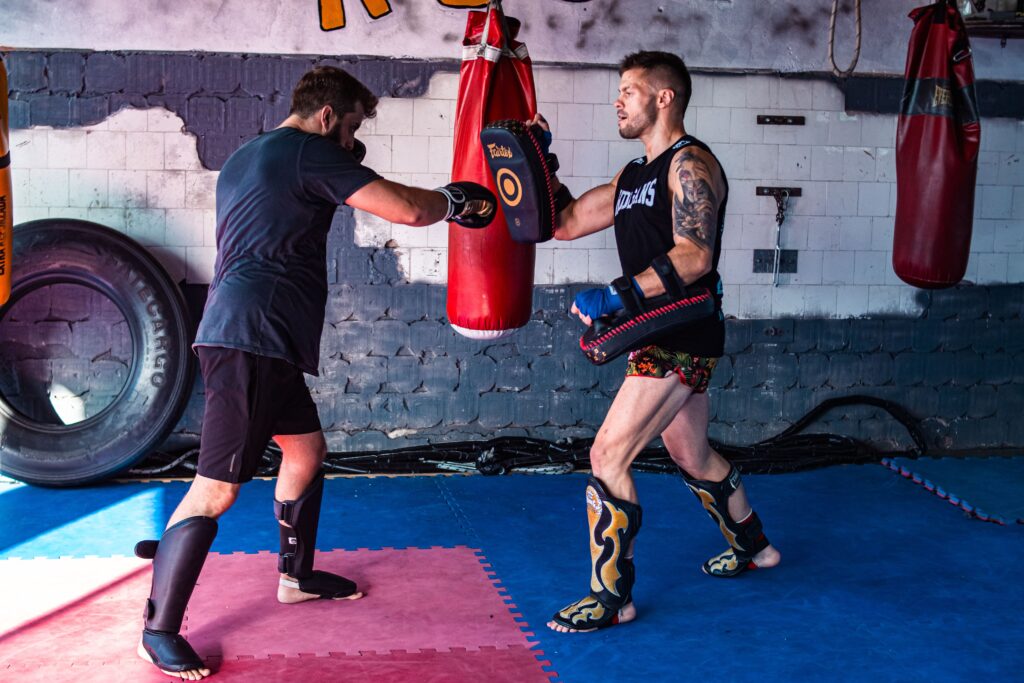 Wholesale MMA shin guards with reinforced padding and secure straps